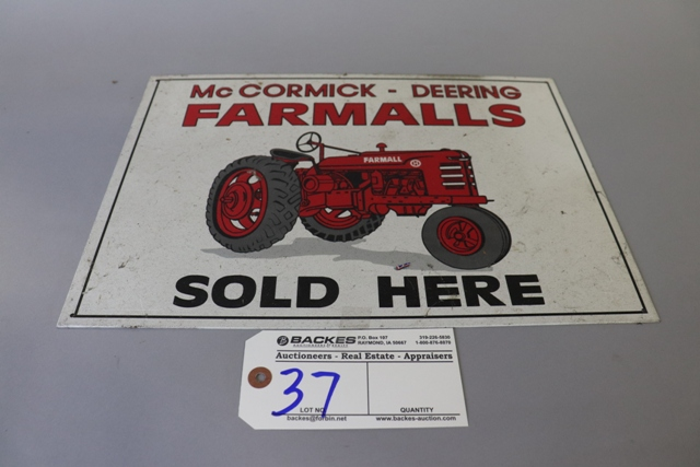 At Auction: 2 Yard Sticks- 1 McCormick Deering